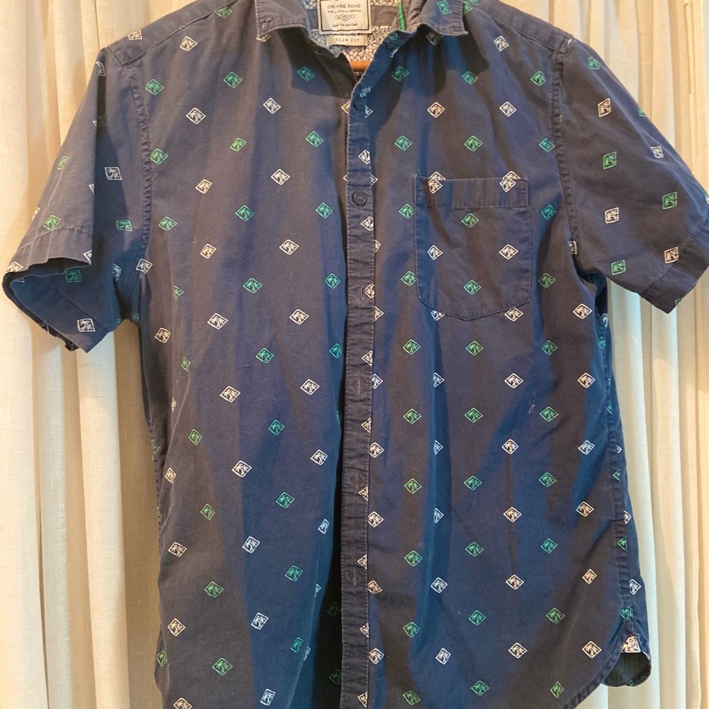 Men’s collared shirt with palm tree design